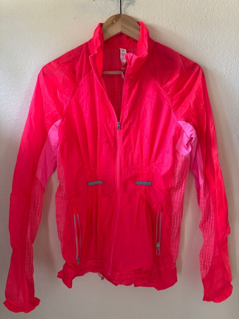 Size 8 Lululemon lightweight pink jacket with pretty lace mesh